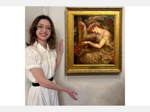 In this photomontage, a smiling young woman, wearing a white dress with a black belt, gestures toward a painting that appears to float beside her. In the painting, a red-haired woman in a cream-colored dress sits with her head inclined toward a stringed instrument she plays. 