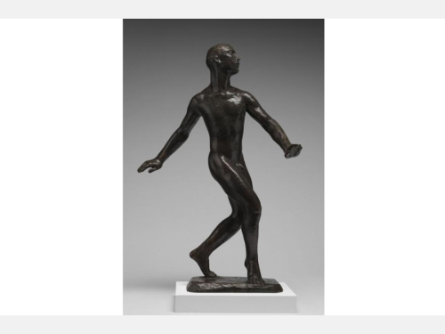 A black bronze sculpture depicts a nude man taking a step forward atop a pedestal, with his arms out wide.