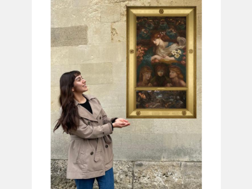 In this photomontage, a smiling young woman gestures toward a large gold-framed painting of young women and flowers in an almost celestial setting; in a section at the bottom, a reclining man stares up at them.