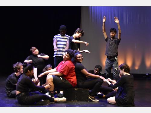 Photo of youth underground performers on stage.