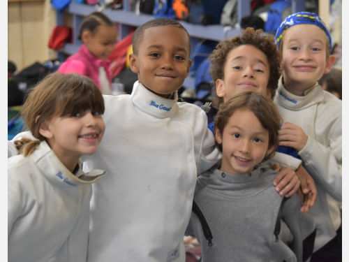 Photo of Olympia Fencing students wearing their gear.