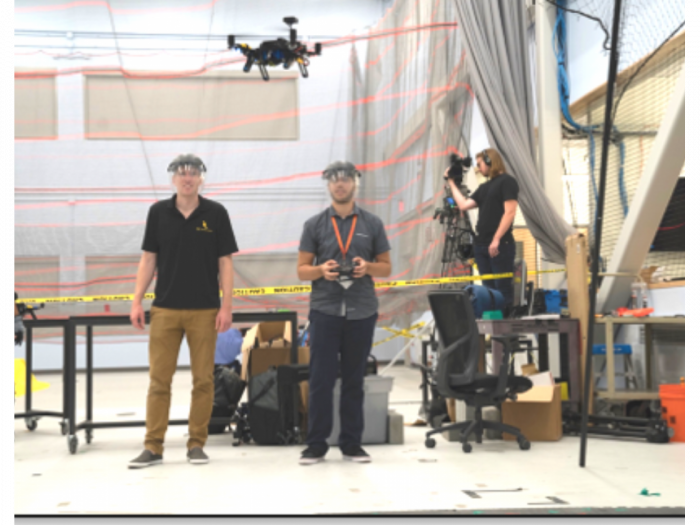 MIT Beaver Works Program photo of students working with a drone.