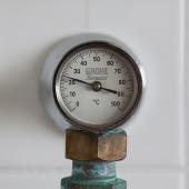 A picture of a water heater thermostat.